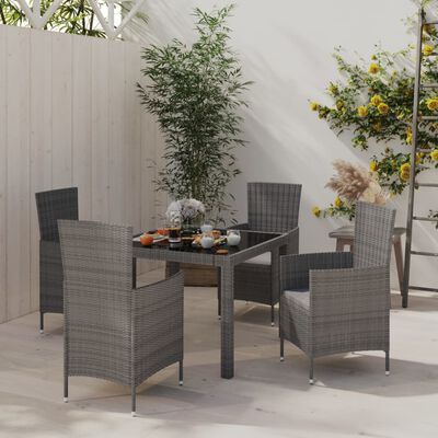 vidaXL Set de comedor de jardín 5 pzas y cojines ratán sintético gris