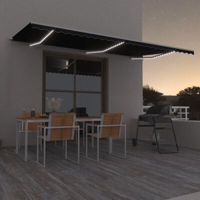 vidaXL Toldo retráctil manual con LED gris antracita 600x350 cm