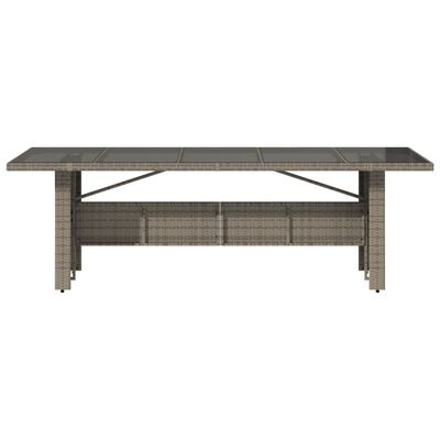 vidaXL Mesa de jardín superficie de vidrio ratán PE gris 240x90x75 cm