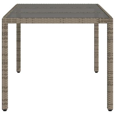 vidaXL Mesa de jardín superficie de vidrio ratán PE gris 150x90x75 cm