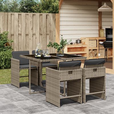 vidaXL Set comedor de jardín 5 piezas con cojines ratán sintético gris