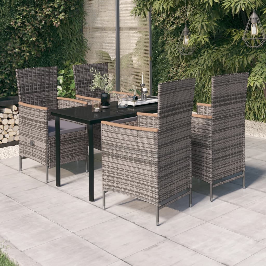 vidaXL Juego de comedor de jardín 5 piezas con cojines gris