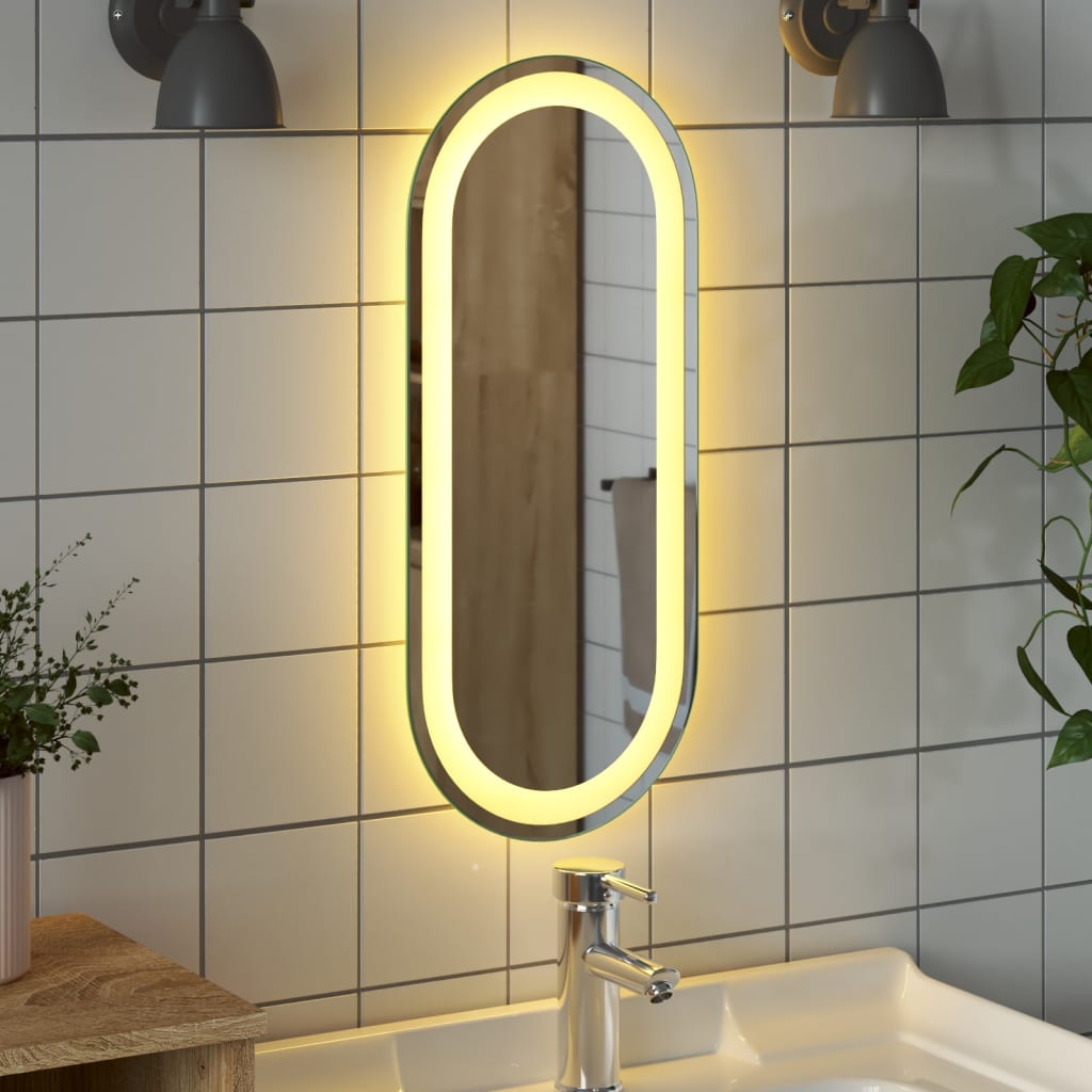 vidaXL Espejo de baño LED ovalado 60x25 cm