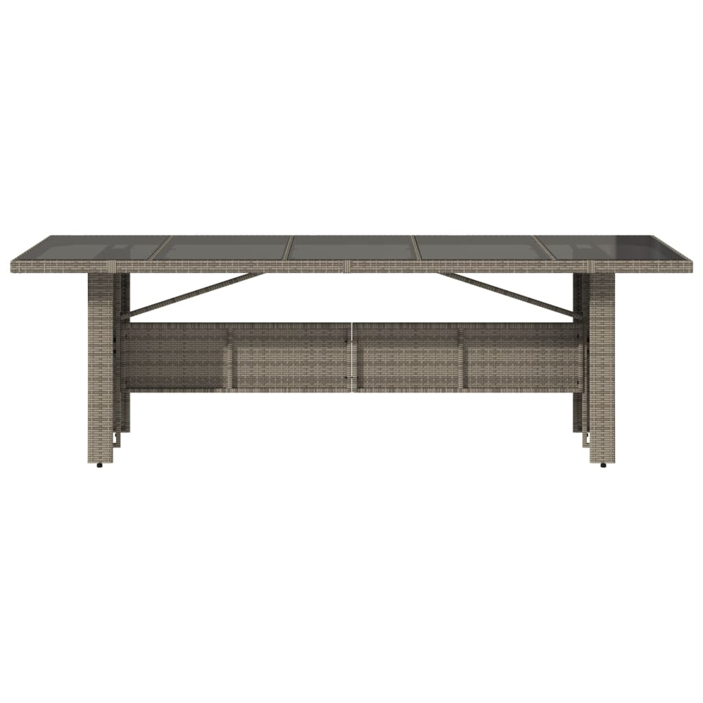 vidaXL Mesa de jardín superficie de vidrio ratán PE gris 240x90x75 cm