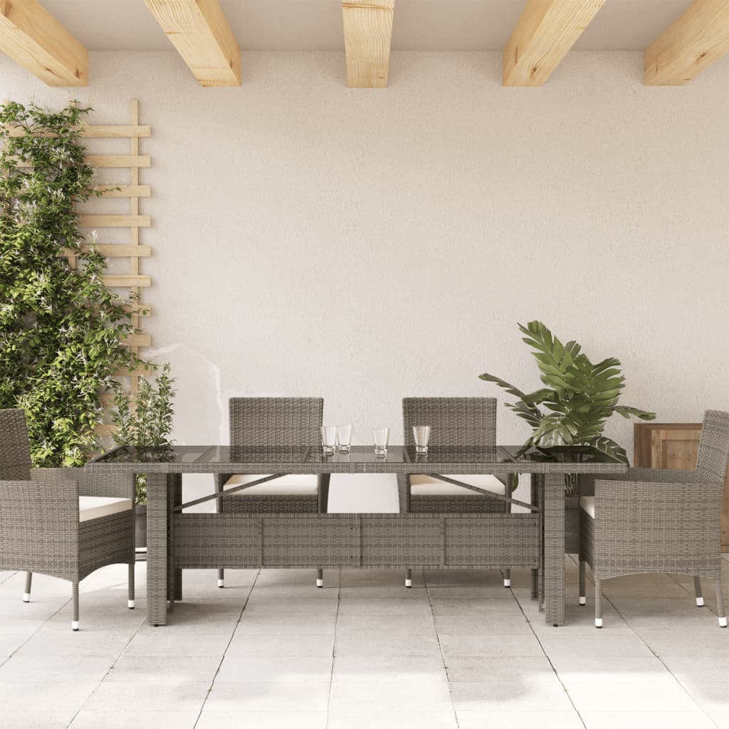 vidaXL Mesa de jardín superficie de vidrio ratán PE gris 240x90x75 cm